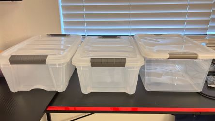 3 plastic storage boxes
