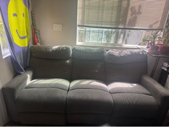 Living Spaces three seat recliner couch