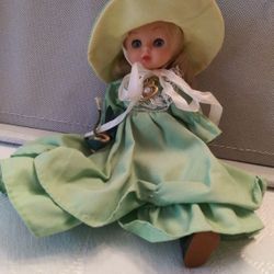 Doll In Green Dress And Hat