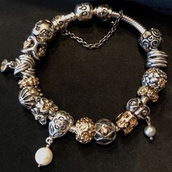 Pandora Sterling Silver/14K Bracelet with 16 Charms