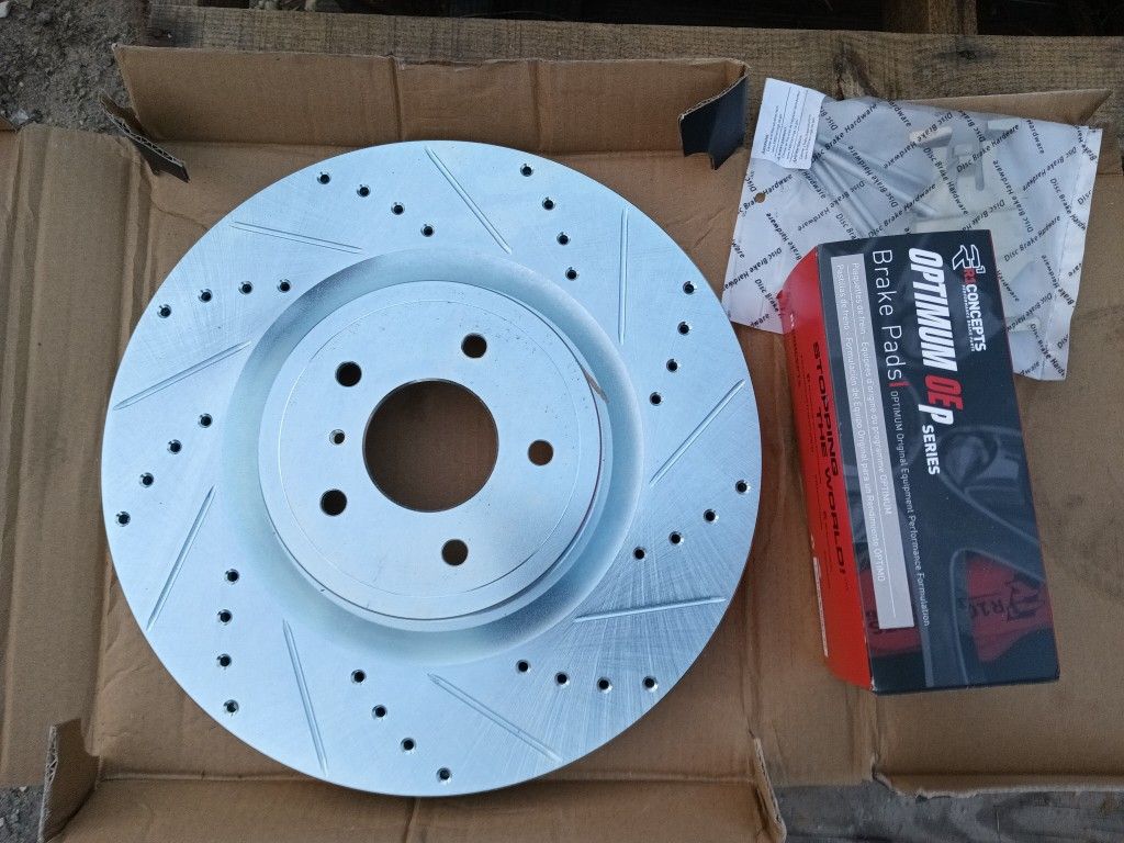 Brand New Left And Right Front Only Rotors And Pads