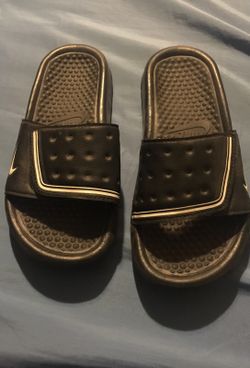 Kids Nike slid shoes