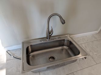 Delta kitchen faucet and deep stainless sink