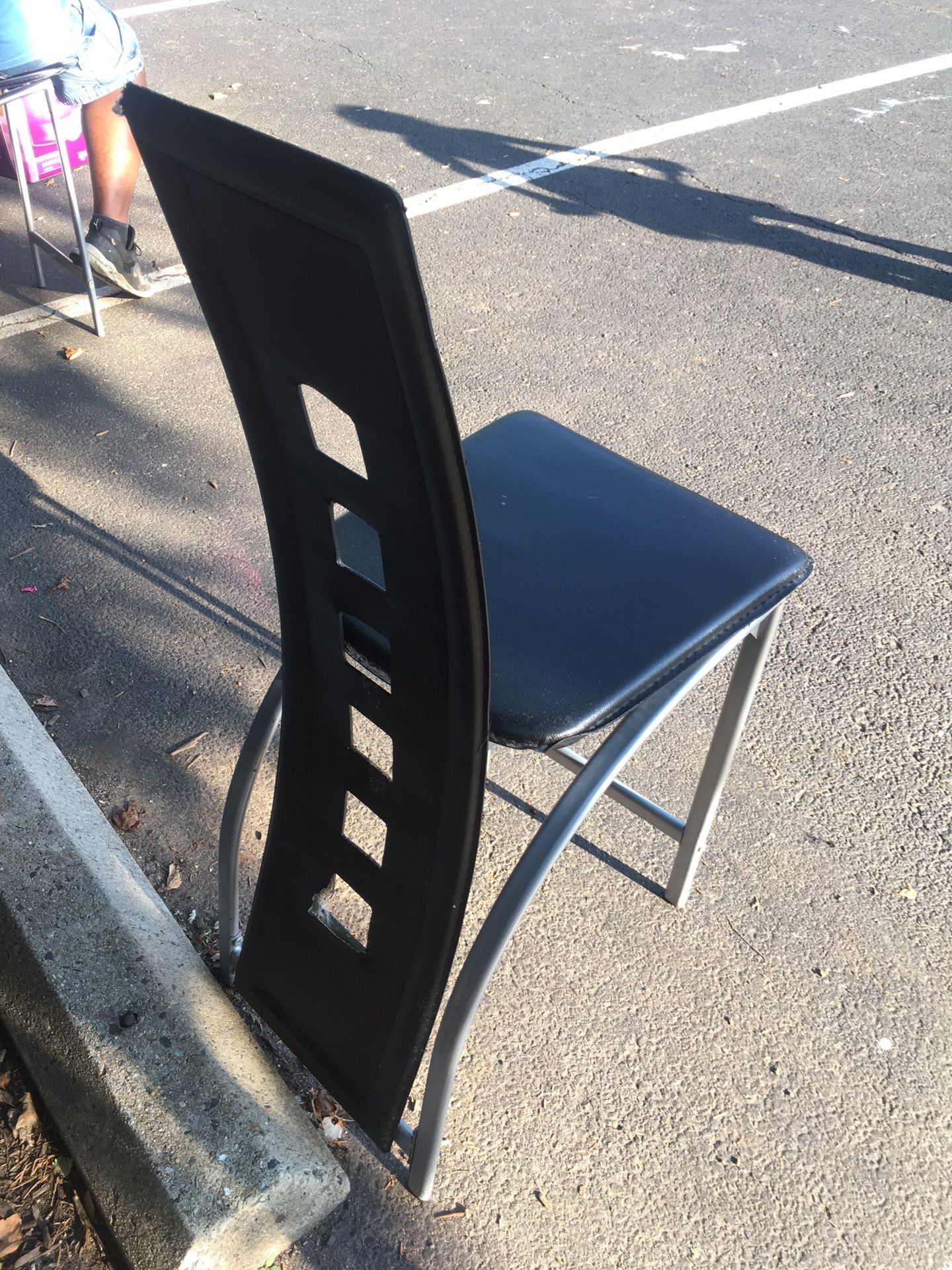 Two black chairs unique design- counter height bar stools