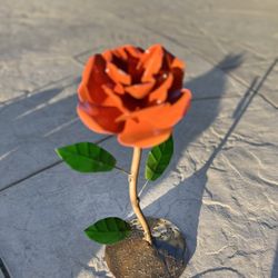 handcrafted Iron roses ..they're a great gifts  for occasions  like   anniversaries or Valentine's Day, They are weatherproof and can be used for both