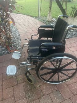 Invacare Essentials EX1 Folding Manual Wheelchair With Swing away Footrests