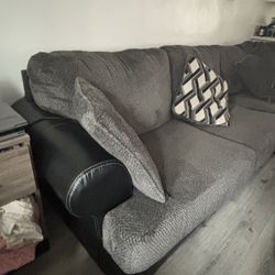 Sectional With Swivel Chair