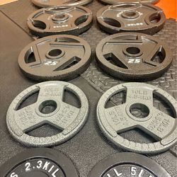 BRAND NEW Full Olympic  Weights Set of Plates: 45s, 35s, 25s, 10s, 5s and 2.5 pounders . Brute: 245 #