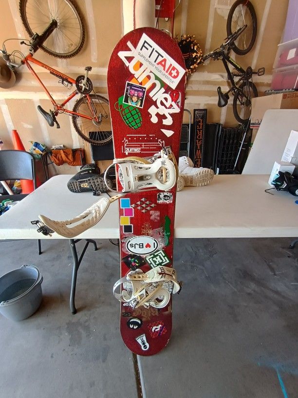 Kink 57" snowboard with carrying case and 2 size 8.5 women's snowboard boots