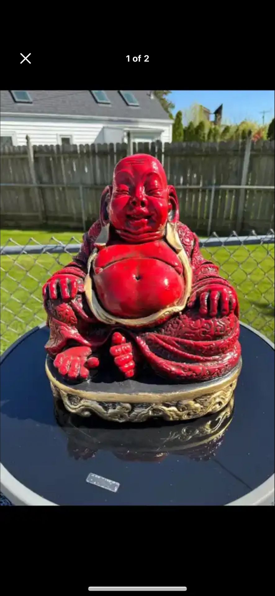 The Red Big Belly Buddha Statue