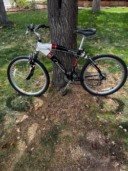 Versatile , full suspension street and trail bike-Aluminum frame,