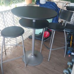 ROUND TABLE WITH BENCHES.