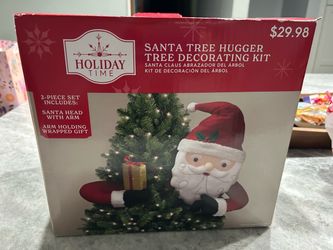Holiday time santa tree hugger