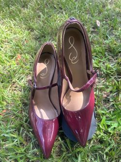 Elegant burgundy patent leather Sam Edelman platform pumps. These shoes are size 9.5