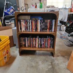 Book Shelf With DVDS and Couple Blu Ray Movies 