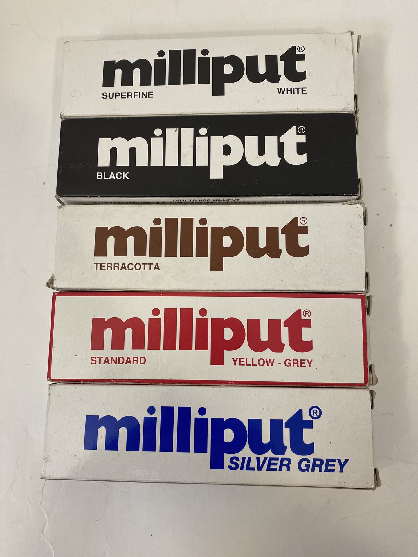 Milliput Lot of 5 Two-Part Epoxy Putty 4 oz each; White, Black, Terracotta, Yellow-Grey, Silver-Grey