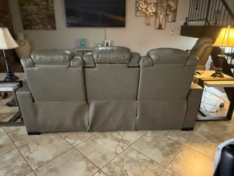 Leather sofa and chair along with two end tables