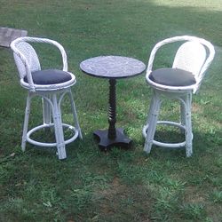 2 Wicker Bar Chairs With Bar Sized Black Table