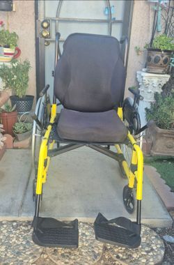 Ki Mobility Yellow Wheelchair up to 350 pounds.