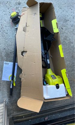 Ryobi two cycle 18 inch 25 cc gas, straight, shaft string trimmer
