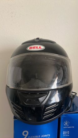 Bell helmet with radio attachment
