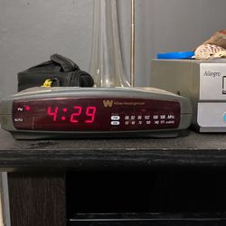 Alarm clock with AM/FM radio