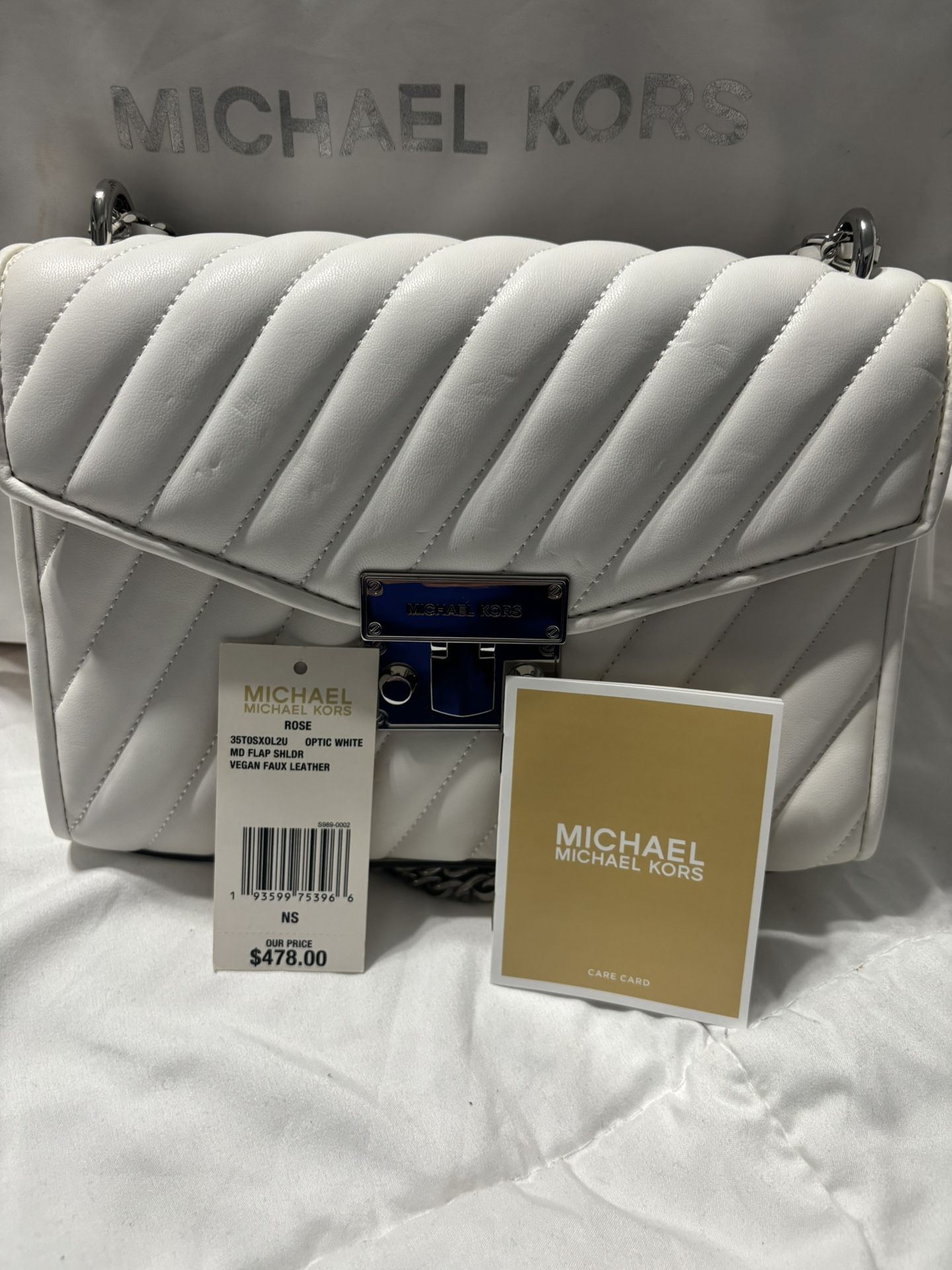 Brand new Michael Kors Beautiful White And Silver 