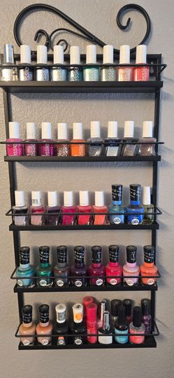 Finger nail polish rack and nail polishes.
