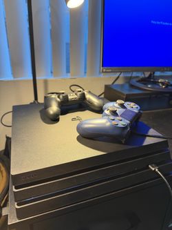 Sony PS4 Pro with Two Controllers
