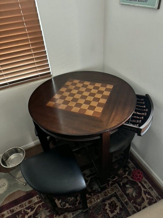 Chess game table and stools.