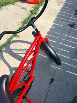 Red beach cruiser Bike with Black Handlebars