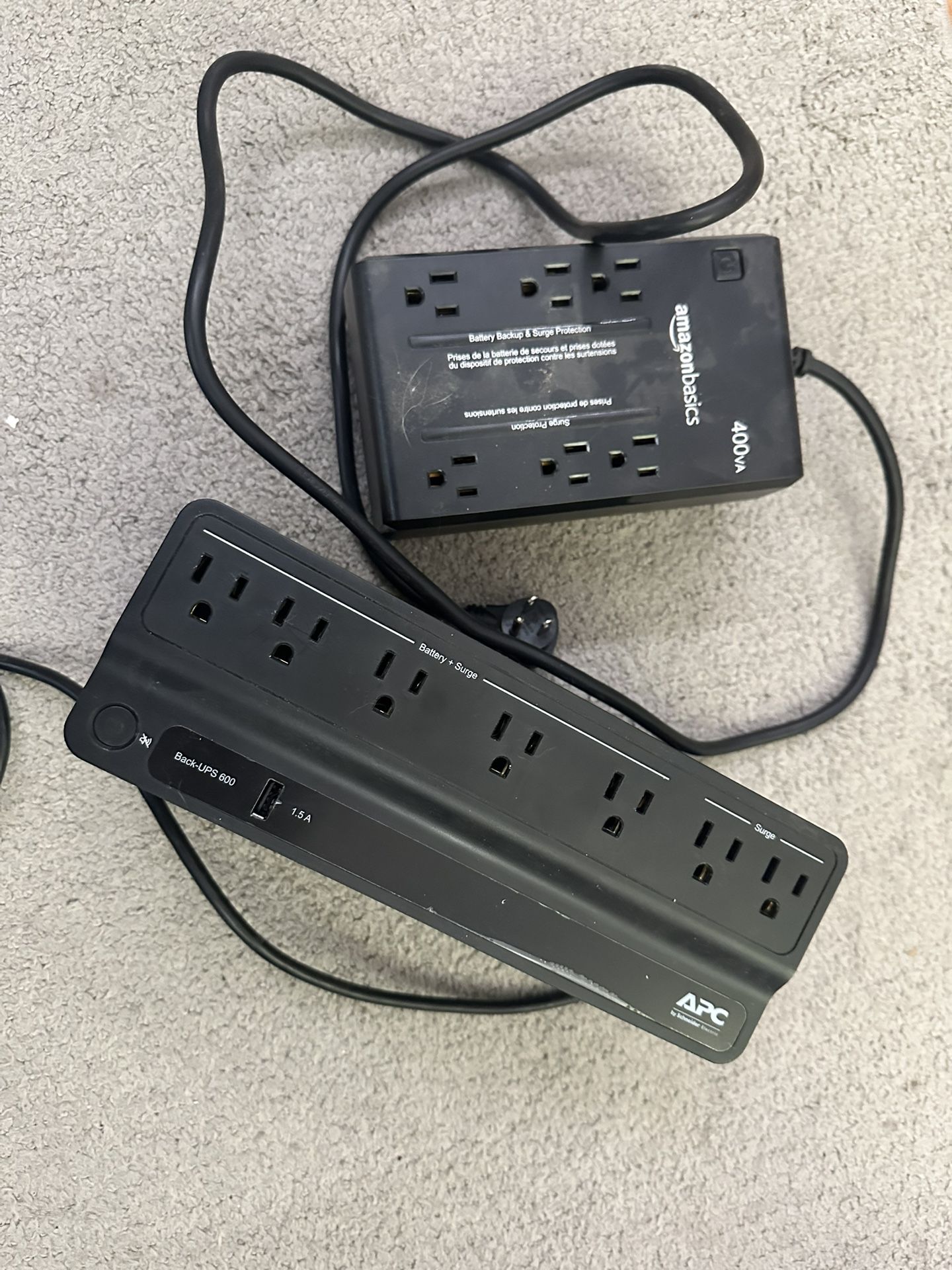 Two UPS Backup and Surge Protectors