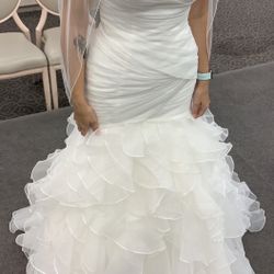 Wedding dress New With Tags $700 Or best offer
