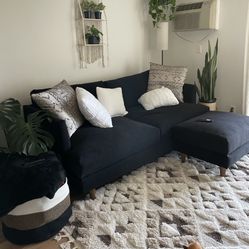 Living Spaces Black Sofa + Ottoman