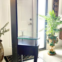 modern console table with a built-in mirror and glass shelf 