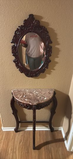 Marble table with mirror