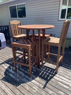 Nice wood height patio table with 2 chairs and 2 stools
