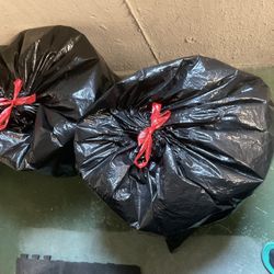 Free Two Bags With Woman’s Clothes