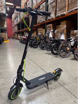 Electric scooter with shock absorption