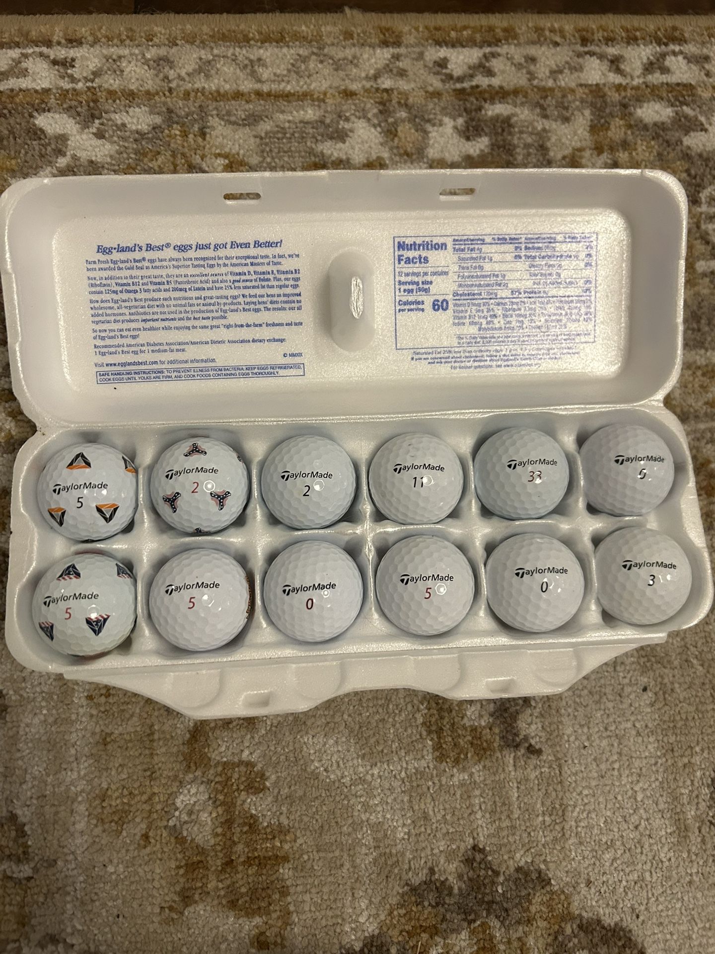 A Dozen TaylorMade Gold Balls