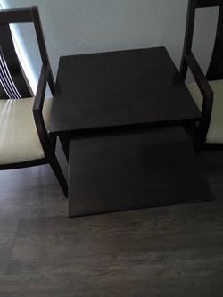 Table that extends with to chairs all wood