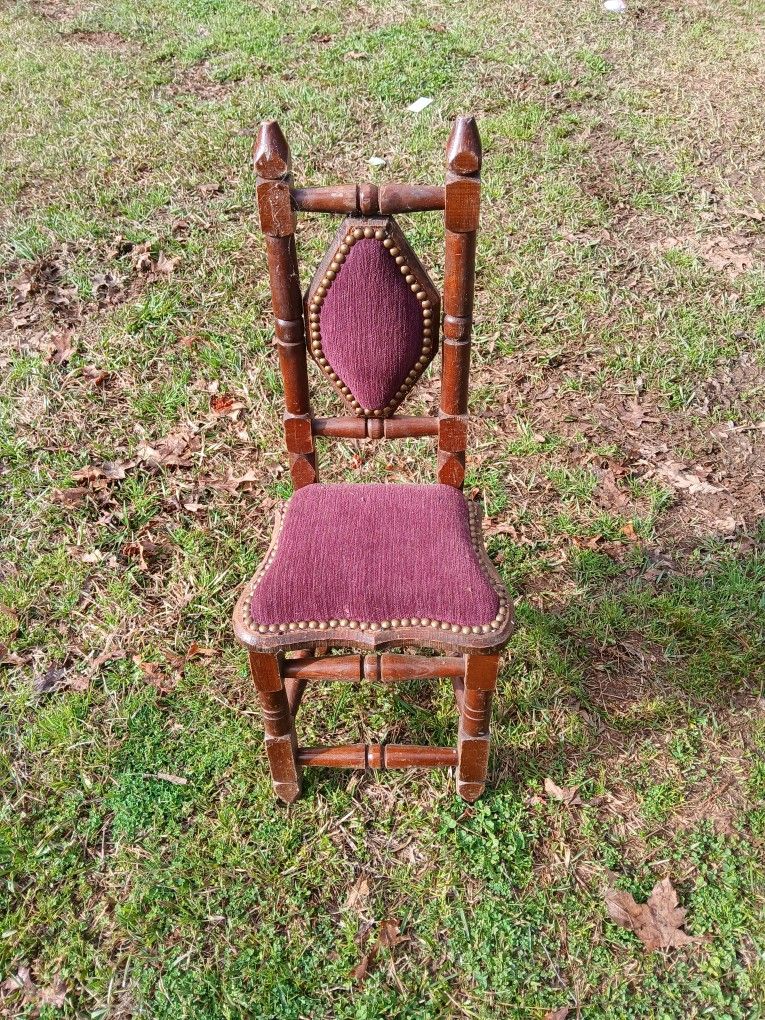 Mid Century Mexican Hacienda Children's ChairThis is a mid 20th century Mexican hacienda children's chair. The gothic wooden chair features red velvet