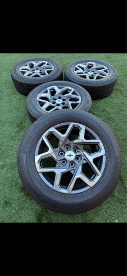 Chevy Silverado stock wheels and tires 20r