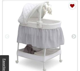 Delta delux gliding bassinet