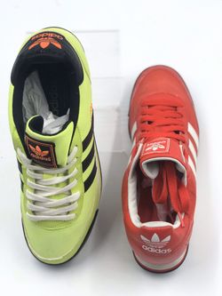 2 pair of Adidas men size 11! Great condition! 1 Bright- 1 Red! Sold together only!