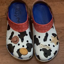 Woody Crocs – Toy Story Disney Pixar Cow Print Clogs w/ Jibbitz Men’s 10/ Women 12