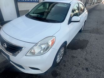 2014 Nissan Versa SV current tags