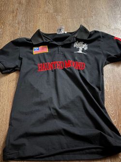 Haunted mound polo Size large
