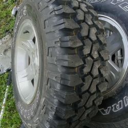 Complete Set Of Mud Tires 