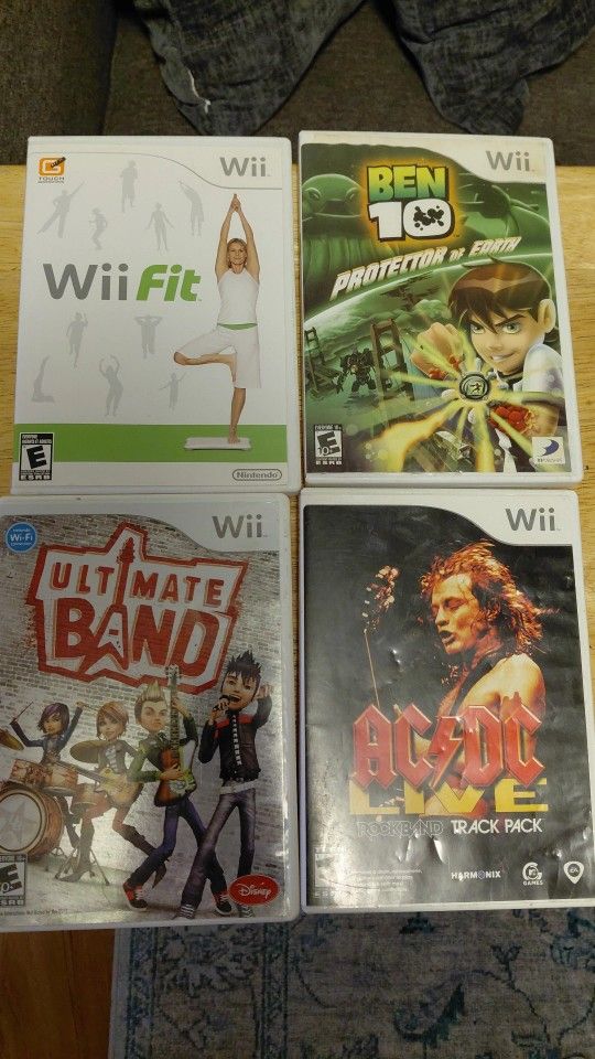 4 Nintendo Wii Games Ultimate Band. Ben 10 . Acdc Love Rock Band. Wii Fit